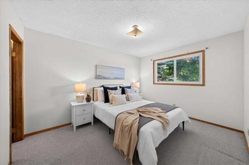 1837 Meadowbrook Drive Se, Airdrie, AB - Indoor Photo Showing Bedroom