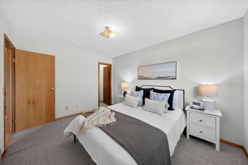 1837 Meadowbrook Drive Se, Airdrie, AB - Indoor Photo Showing Bedroom