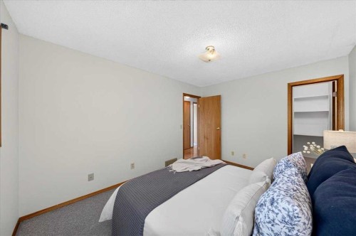1837 Meadowbrook Drive Se, Airdrie, AB - Indoor Photo Showing Bedroom