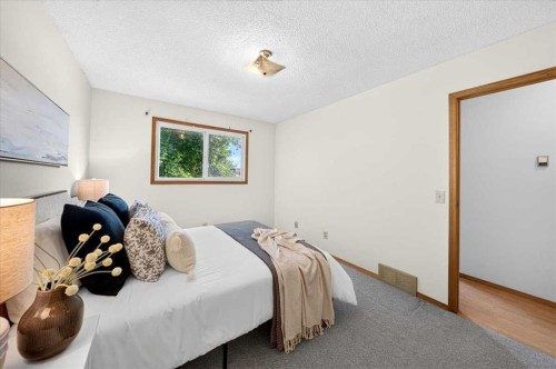 1837 Meadowbrook Drive Se, Airdrie, AB - Indoor Photo Showing Bedroom