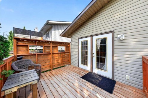 1837 Meadowbrook Drive Se, Airdrie, AB - Outdoor With Deck Patio Veranda With Exterior
