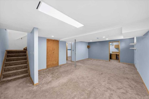 1837 Meadowbrook Drive Se, Airdrie, AB - Indoor Photo Showing Other Room