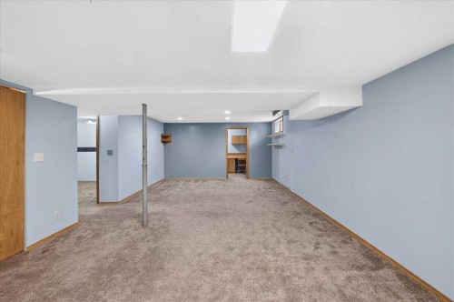 1837 Meadowbrook Drive Se, Airdrie, AB - Indoor Photo Showing Other Room