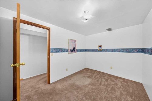 1837 Meadowbrook Drive Se, Airdrie, AB - Indoor Photo Showing Other Room