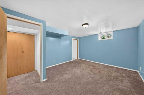 1837 Meadowbrook Drive Se, Airdrie, AB - Indoor Photo Showing Other Room
