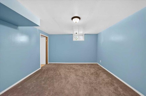 1837 Meadowbrook Drive Se, Airdrie, AB - Indoor Photo Showing Other Room