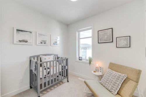 839 Belmont Drive Sw, Calgary, AB - Indoor Photo Showing Bedroom