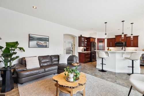 97 Tanner Close Se, Airdrie, AB - Indoor Photo Showing Living Room