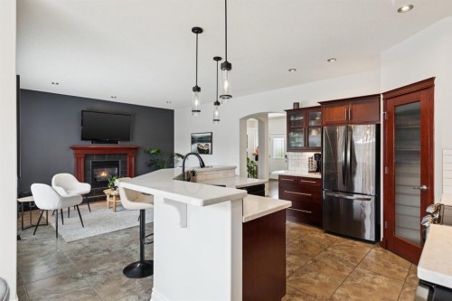 97 Tanner Close Se, Airdrie, AB - Indoor Photo Showing Kitchen With Upgraded Kitchen