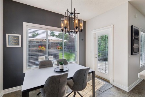 97 Tanner Close Se, Airdrie, AB - Indoor Photo Showing Dining Room
