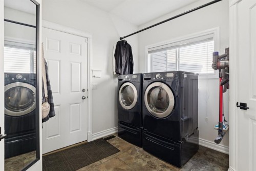 97 Tanner Close Se, Airdrie, AB - Indoor Photo Showing Laundry Room