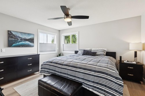 97 Tanner Close Se, Airdrie, AB - Indoor Photo Showing Bedroom