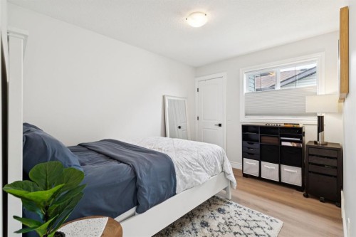 97 Tanner Close Se, Airdrie, AB - Indoor Photo Showing Bedroom
