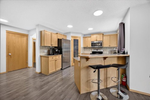 2745 Coopers Manor Sw, Airdrie, AB - Indoor Photo Showing Kitchen