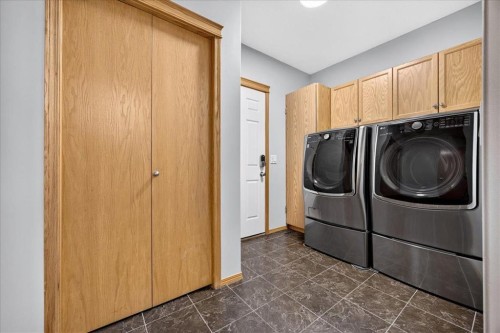 2745 Coopers Manor Sw, Airdrie, AB - Indoor Photo Showing Laundry Room