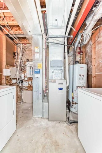 52 Taralake Street Ne, Calgary, AB - Indoor Photo Showing Laundry Room