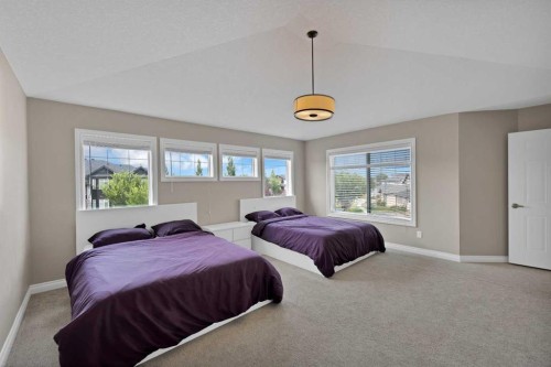 146 Canoe Crescent Sw, Airdrie, AB - Indoor Photo Showing Bedroom