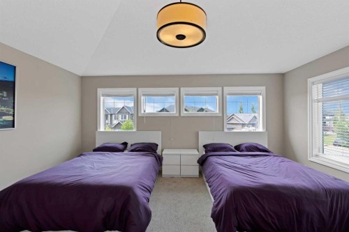 146 Canoe Crescent Sw, Airdrie, AB - Indoor Photo Showing Bedroom