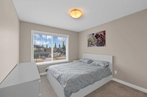 146 Canoe Crescent Sw, Airdrie, AB - Indoor Photo Showing Bedroom