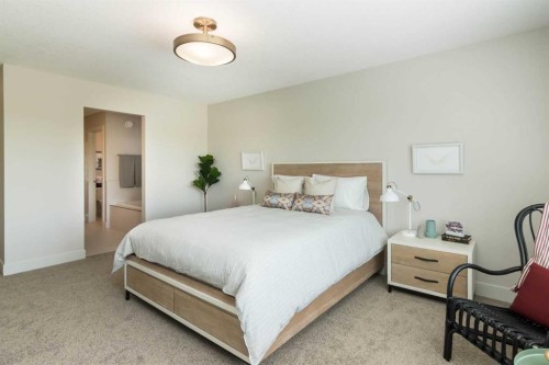 542 Rivercrest View, Cochrane, AB - Indoor Photo Showing Bedroom