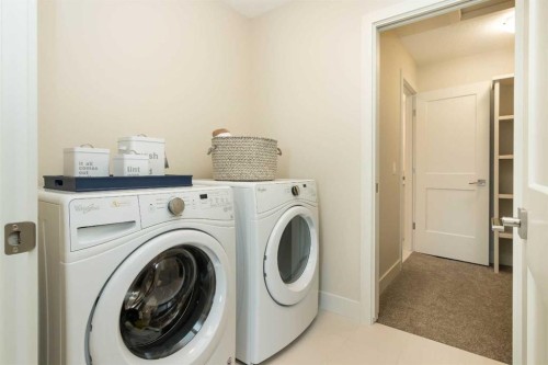 542 Rivercrest View, Cochrane, AB - Indoor Photo Showing Laundry Room