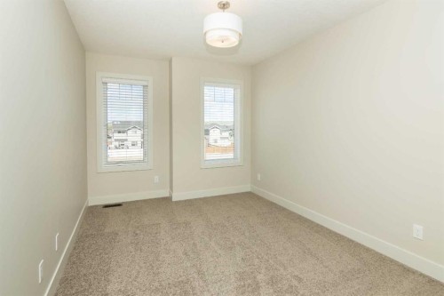 542 Rivercrest View, Cochrane, AB - Indoor Photo Showing Other Room