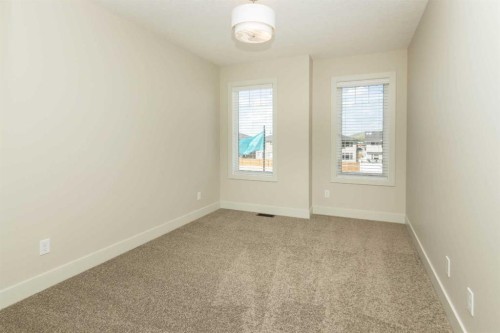 542 Rivercrest View, Cochrane, AB - Indoor Photo Showing Other Room