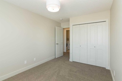 542 Rivercrest View, Cochrane, AB - Indoor Photo Showing Other Room