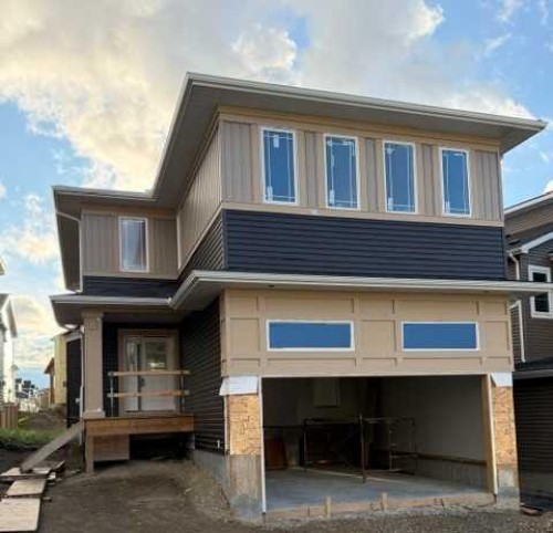 542 Rivercrest View, Cochrane, AB - Outdoor With Deck Patio Veranda With Facade