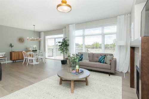 542 Rivercrest View, Cochrane, AB - Indoor Photo Showing Living Room