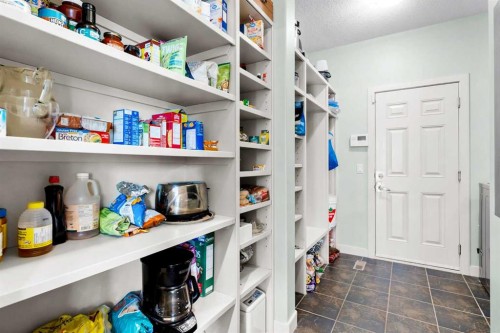 19 Sunset Circle, Cochrane, AB - Indoor With Storage