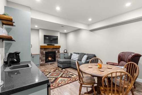 19 Sunset Circle, Cochrane, AB - Indoor With Fireplace