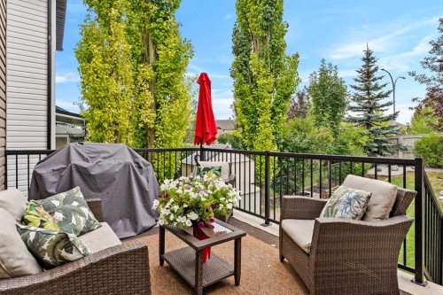 19 Sunset Circle, Cochrane, AB - Outdoor With Deck Patio Veranda With Exterior
