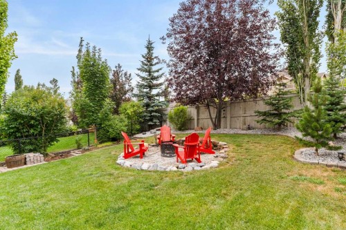 19 Sunset Circle, Cochrane, AB - Outdoor With Backyard