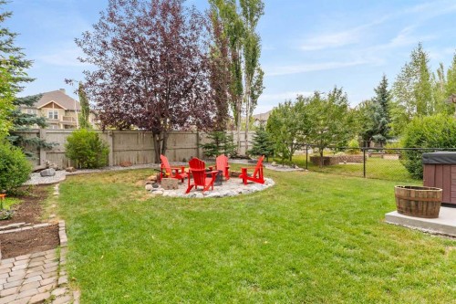 19 Sunset Circle, Cochrane, AB - Outdoor With Backyard
