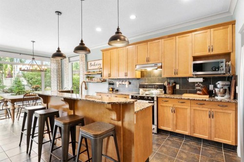 19 Sunset Circle, Cochrane, AB - Indoor Photo Showing Kitchen
