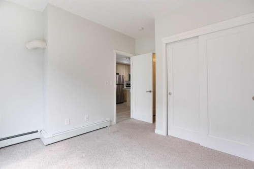 206-71 Shawnee Common Sw, Calgary, AB - Indoor Photo Showing Other Room