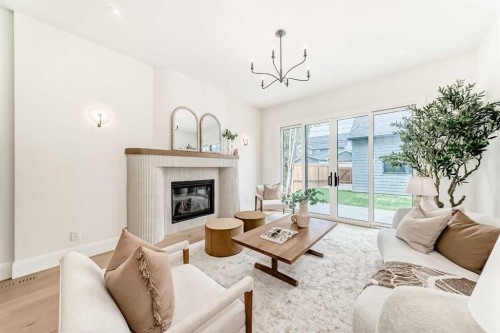 1612 49 Avenue Sw, Calgary, AB - Indoor Photo Showing Living Room With Fireplace