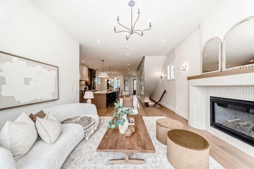 1612 49 Avenue Sw, Calgary, AB - Indoor Photo Showing Living Room With Fireplace