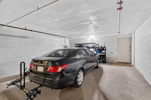 6-1726 8 Avenue Nw, Calgary, AB - Indoor Photo Showing Garage