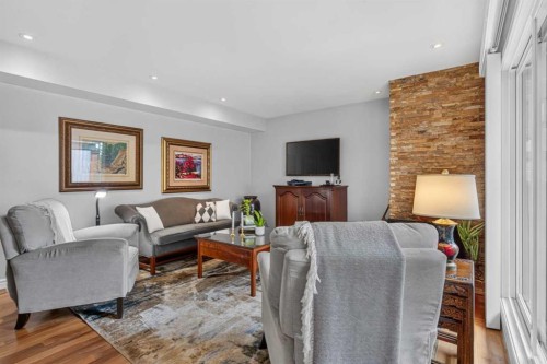 6-1726 8 Avenue Nw, Calgary, AB - Indoor Photo Showing Living Room