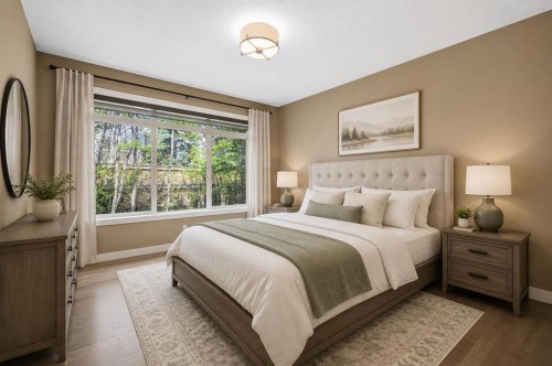 63 Cortina Villas Sw, Calgary, AB - Indoor Photo Showing Bedroom
