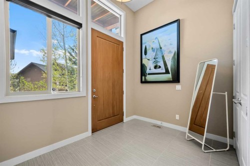 63 Cortina Villas Sw, Calgary, AB - Indoor Photo Showing Other Room