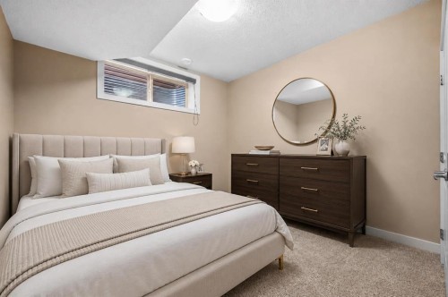 63 Cortina Villas Sw, Calgary, AB - Indoor Photo Showing Bedroom