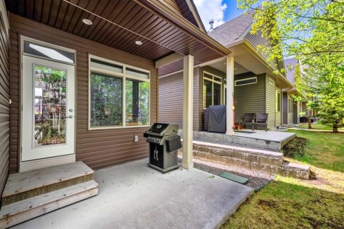 63 Cortina Villas Sw, Calgary, AB - Outdoor With Deck Patio Veranda With Exterior