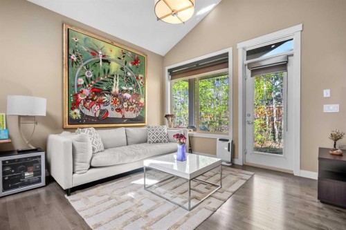 63 Cortina Villas Sw, Calgary, AB - Indoor Photo Showing Living Room