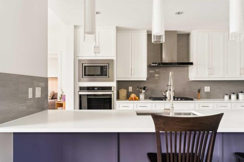 25 Quarry Common Se, Calgary, AB - Indoor Photo Showing Kitchen With Upgraded Kitchen