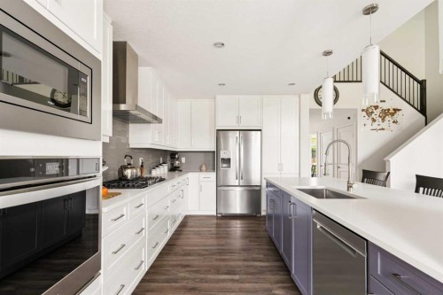 25 Quarry Common Se, Calgary, AB - Indoor Photo Showing Kitchen With Upgraded Kitchen
