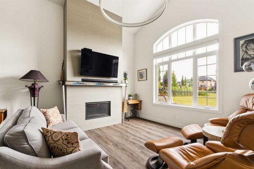 25 Quarry Common Se, Calgary, AB - Indoor Photo Showing Living Room With Fireplace
