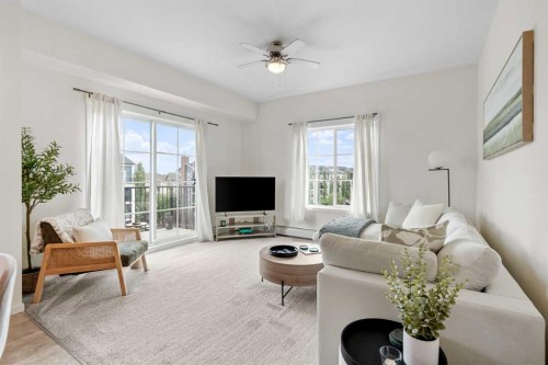 4418-99 Copperstone Park Se, Calgary, AB - Indoor Photo Showing Living Room
